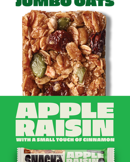 Apple Raisin Cinnamon gut-friendly oat bar close-up. The bar contains juicy raisins, sweet apple pieces, and jumbo oats, making a great tasting and chewy snack.